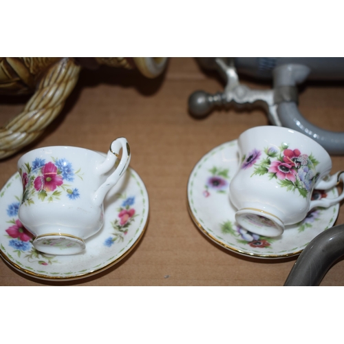 155A - Pottery to include miniature Royal Albert Flower of the Month tea cups and saucers, with German styl... 