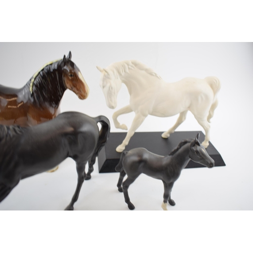 110 - Beswick to include matt Spirit of Freedom, Black Beauty and Foal and 818 brown shire (4).