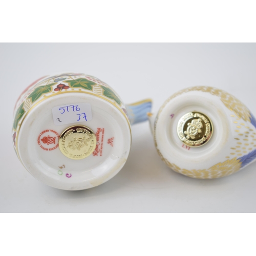 2 - Royal Crown Derby paperweights to include a Robin Nesting and a Goldcrest, with gold stoppers (2).
