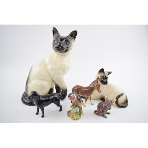 73 - Beswick animals to include a black labrador, a donkey foal, a mouse, a goldfinch and 2 siamese cats ... 