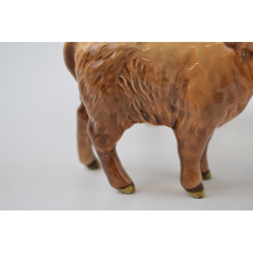 76 - Beswick Highland cow 2008 (horn af) with 2 Highland calves (1 af) (3).