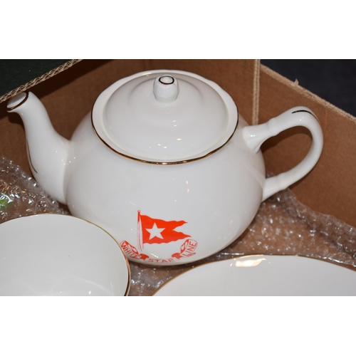 179 - Claytondale tea set with 'White Star Line' decoration to include a teapot, milk and sugar with trios... 