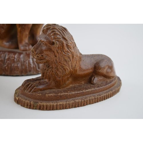 180A - A trio of 19th century salt glaze stoneware animals to include a lion, a spaniel and another lion, l... 