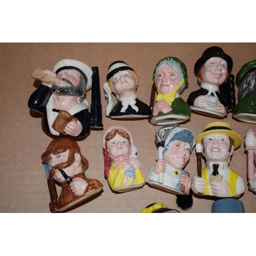 186 - A collection of miniature Masons character jugs to include a chef, a Scotsman, a flower seller and o... 