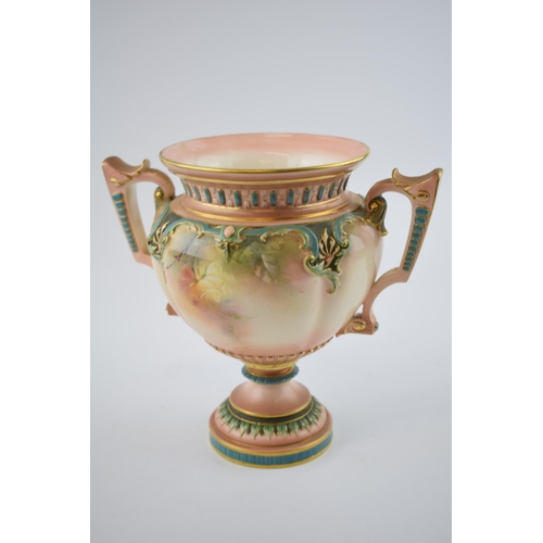 221 - Hadley's Worcester double handled pedestal vase with floral decoration, 20cm tall (1 handle af).