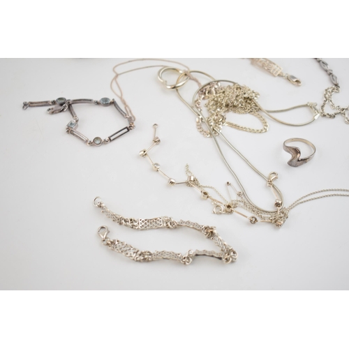 277 - A collection of silver jewellery to include necklaces, a heavy turqouise style pendant, a Jade (or s... 