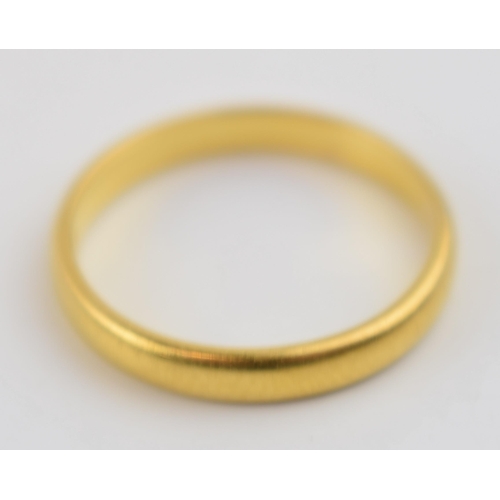 279 - 22ct gold wedding band, size K, 2.6 grams.