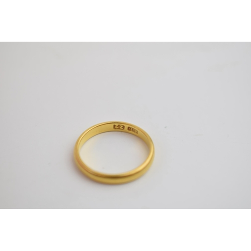 279 - 22ct gold wedding band, size K, 2.6 grams.