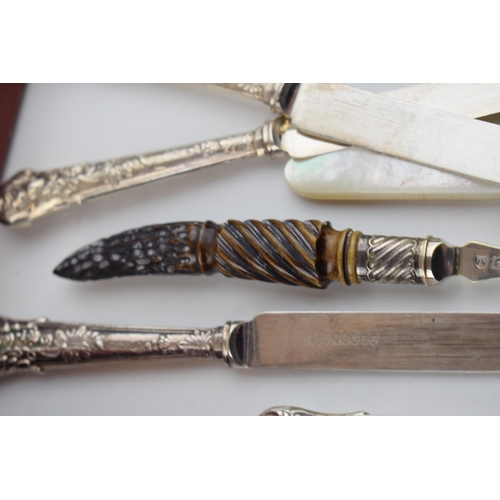 385 - A set of cased horn handled carving knives by Gee Holmes Ltd, Sheffield together with a set of cased... 