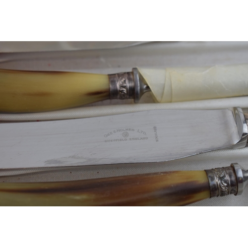 385 - A set of cased horn handled carving knives by Gee Holmes Ltd, Sheffield together with a set of cased... 