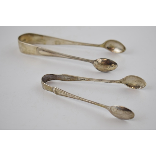 394 - A pair of hallmarked silver sugar tongs (2), 40.6 grams.