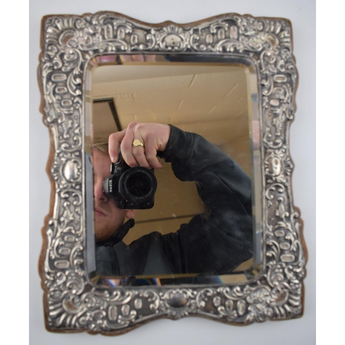 397 - Hallmarked silver framed rectangular mirror, on wooden back, Birmingham 1905, 28.5cm tall.