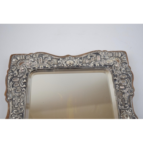 397 - Hallmarked silver framed rectangular mirror, on wooden back, Birmingham 1905, 28.5cm tall.