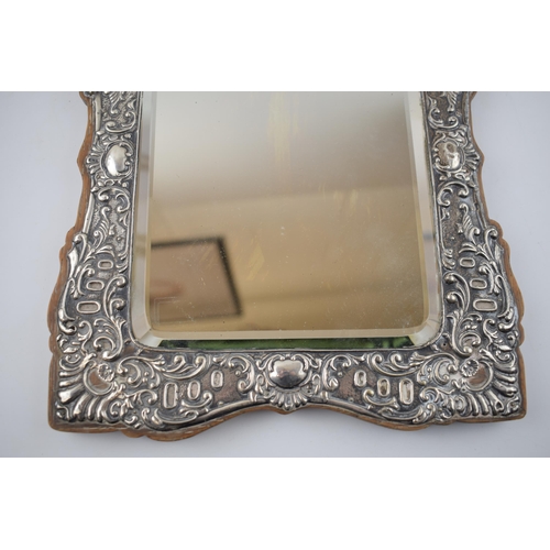 397 - Hallmarked silver framed rectangular mirror, on wooden back, Birmingham 1905, 28.5cm tall.