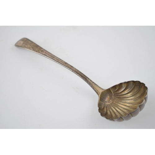 401 - A Georgian silver shell shaped ladle hallmarked London 1818. Length 17cm. Weight  45.1 grams.