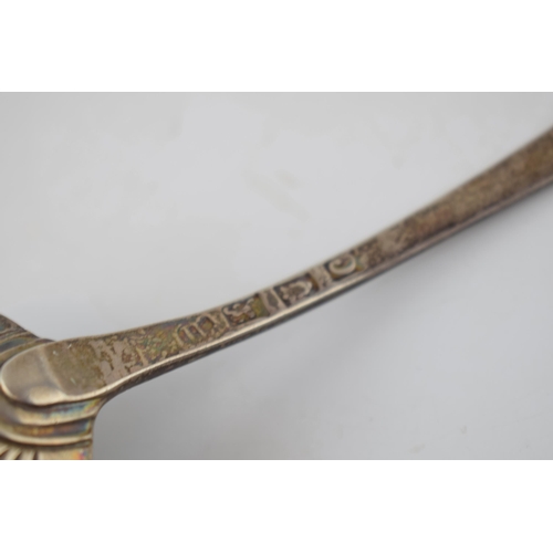 401 - A Georgian silver shell shaped ladle hallmarked London 1818. Length 17cm. Weight  45.1 grams.