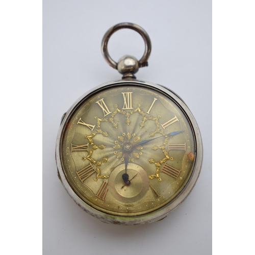 404 - 19th century silver pocket watch with blued hands and yellow coloured Roman numerals, 55mm wide (req... 