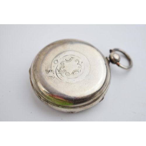 404 - 19th century silver pocket watch with blued hands and yellow coloured Roman numerals, 55mm wide (req... 