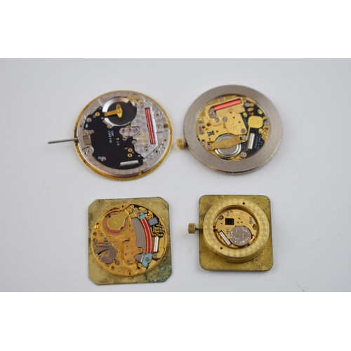 406 - 4 Men's Omega quartz watch movements with dials and hands. Calibre 1532, 1377, 1378, ETAAb E01.001. ... 