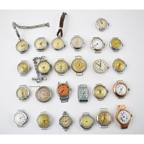 407 - WWI assorted trench watches a good quantity for spares or repairs with some working examples. (25+)