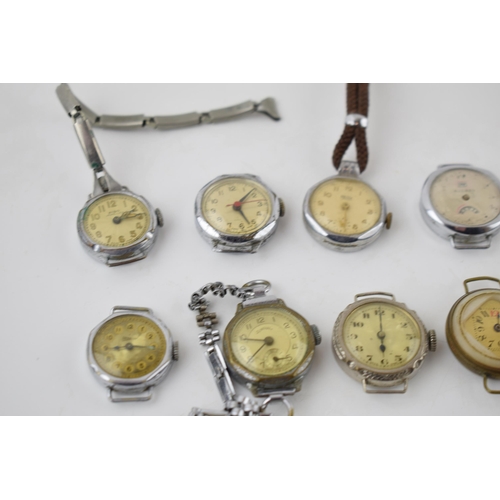 407 - WWI assorted trench watches a good quantity for spares or repairs with some working examples. (25+)