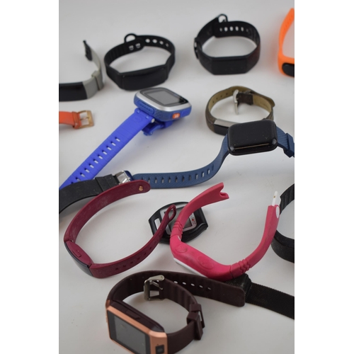 425 - A collection of over 20 fitness watches of note Garmin and TomTom examples. (20)