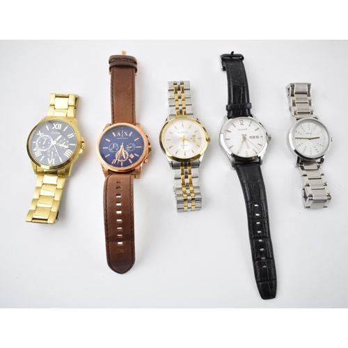 428 - A collection of gentleman’s fashion watches to include Armani, Rossini, DKNY, Accurist and Guess. (5... 