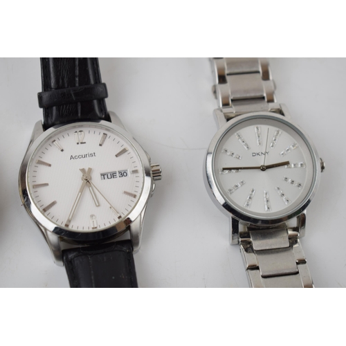 428 - A collection of gentleman’s fashion watches to include Armani, Rossini, DKNY, Accurist and Guess. (5... 