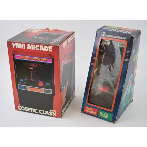 657 - Vintage boxed electronic games to include 'Tomy Cosmic Clash - Mini Arcade' together with 'U.F.O. In... 