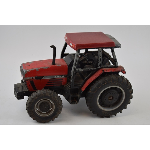 661 - 1/16th scale Ertl 1989 tractor model of a Case Maxxum 5250, playworn condition.