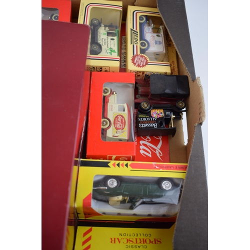 666 - A collection of boxed die cast model cars and trucks to include Coco Cola vehicle collection, Corgi ... 