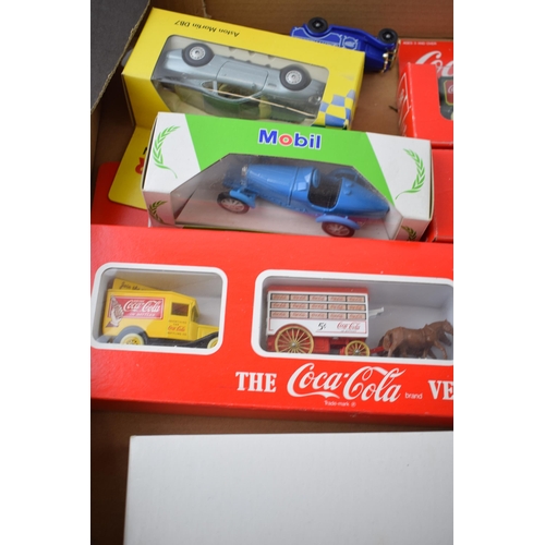 666 - A collection of boxed die cast model cars and trucks to include Coco Cola vehicle collection, Corgi ... 