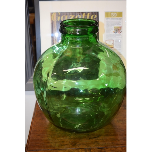 697 - A pair of large Viresa green glass carboys, 35cm tall, together with a Bells Scotch Whisky bottle (3... 