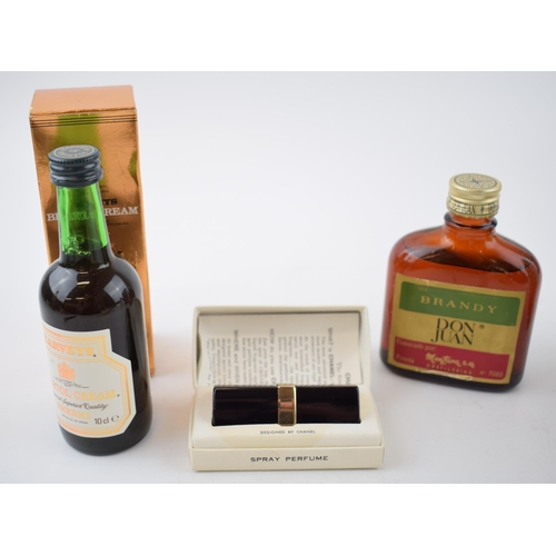 698 - A  10cl bottle of Harvey's Bristol Cream sherry in original outer box, together with a bottle of Don... 