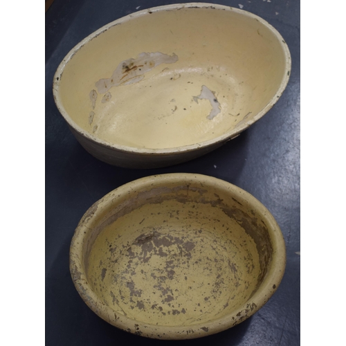 705 - A pair of pulp ware oval bowls / baby baths, longest 68cm, makers marks to underside (2).