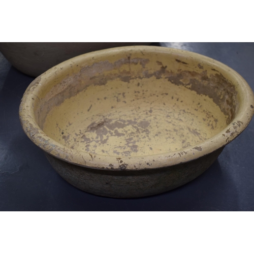 705 - A pair of pulp ware oval bowls / baby baths, longest 68cm, makers marks to underside (2).