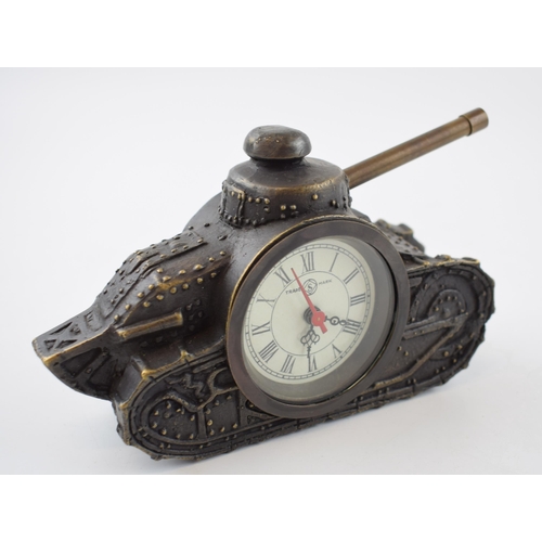 423 - Metal bronze effect mantle clock in the form of a mechanical tank, 16cm wide, working order.