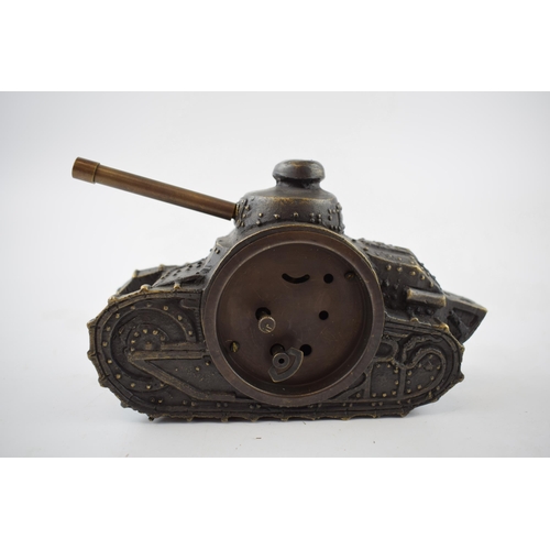 423 - Metal bronze effect mantle clock in the form of a mechanical tank, 16cm wide, working order.