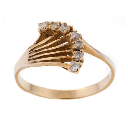 456 - 18ct gold ring with CZs and ornate shoulder in the form of a bouquet of flowers, 2.5 grams, size Q.