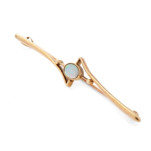 482 - 15ct gold bar brooch set with central opal, 3.8 grams, 64mm.