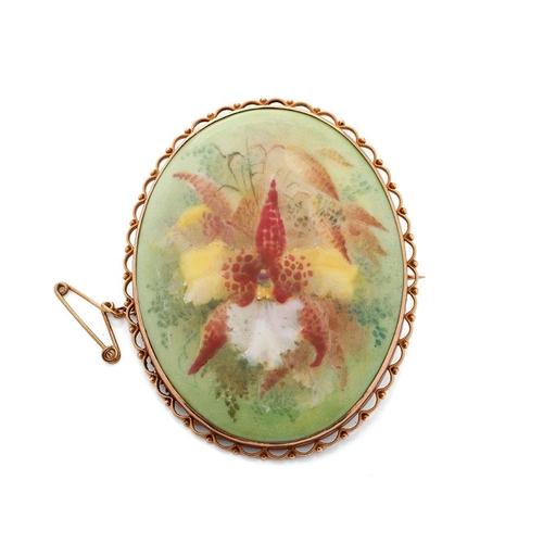 488 - 9ct gold cased painted porcelain miniature, with floral decoration, signed D Dewsberry, 58mm wide, w... 