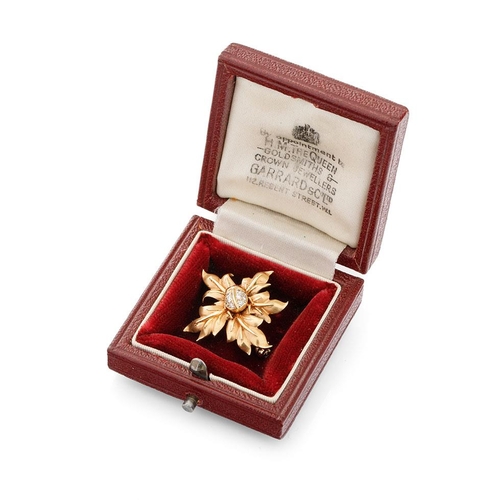 493 - 18ct gold brooch in the form of a ladybird sat on foliage, set with old cut diamonds with enamelled ...
