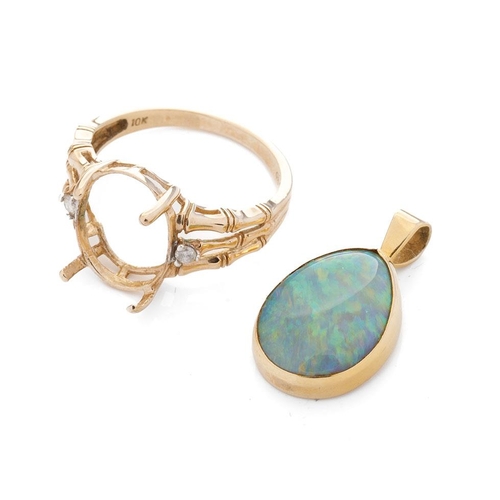 495 - A 9ct gold pendant with opal-style insert together with a 9ct gold ring setting, combined 4.8 grams ... 