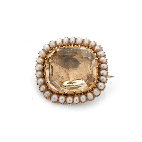 518 - Georgian high carat foil back brooch set with yellow topaz and pearls, 26mm wide, 7.5 grams.