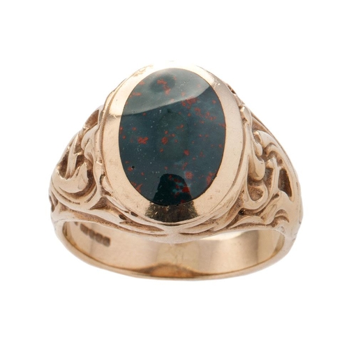 537 - 9ct gold ring with ornate shoulder, set with agate, size V, 10.0 grams.