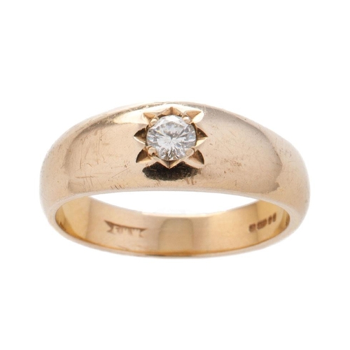 598 - 9ct gold hallmarked single diamond gypsy set ring, diamond measures 0.20 ct approx.  Weight 5.8g, ri... 