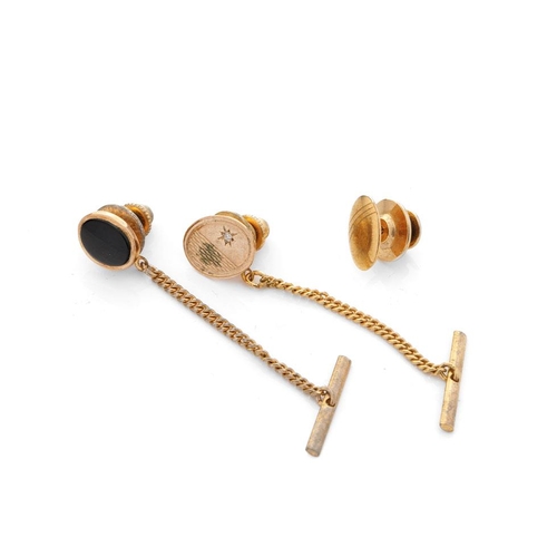 600 - 3 x 9ct gold tie tacks / studs, with base metal retainers, weight of weighable gold 2.5g, one plain ... 