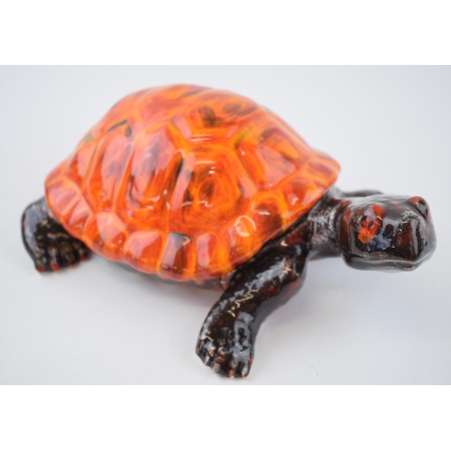 113 - Anita Harris Art Pottery tortoise, 24cm long, signed by Anita.