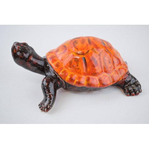 113 - Anita Harris Art Pottery tortoise, 24cm long, signed by Anita.