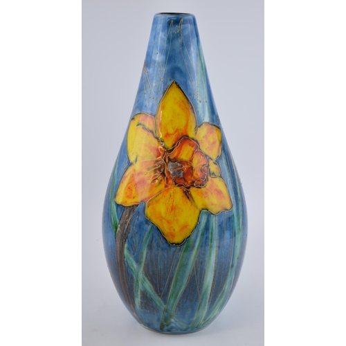 117 - Early Anita Harris Art Pottery peardrop vase, decorated with a Dafodil, 40cm tall, signed by Anita.